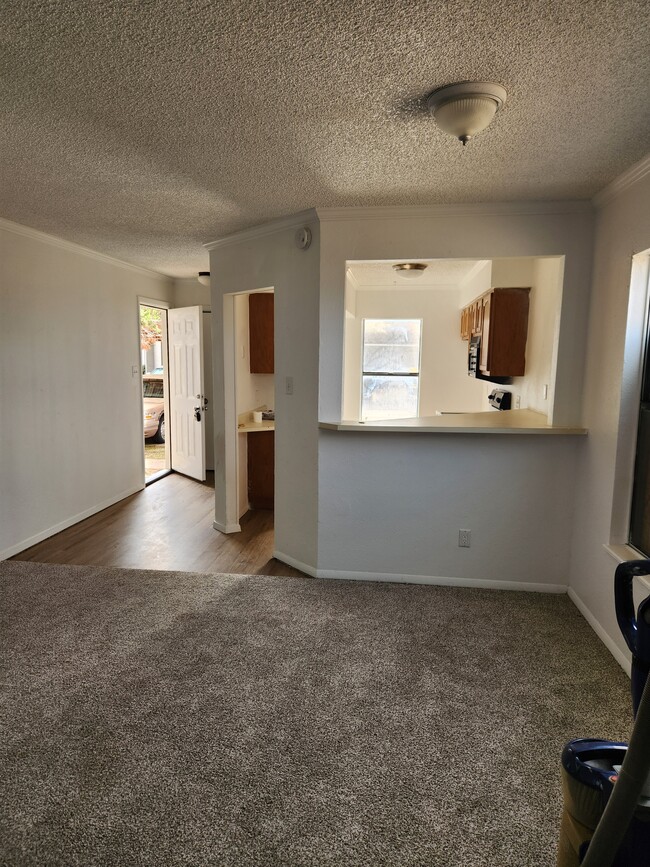 Entry and eat in Kitchen. Dishwasher, Range, Microwave, Washer dryer hookups, - 7408 Avenue X