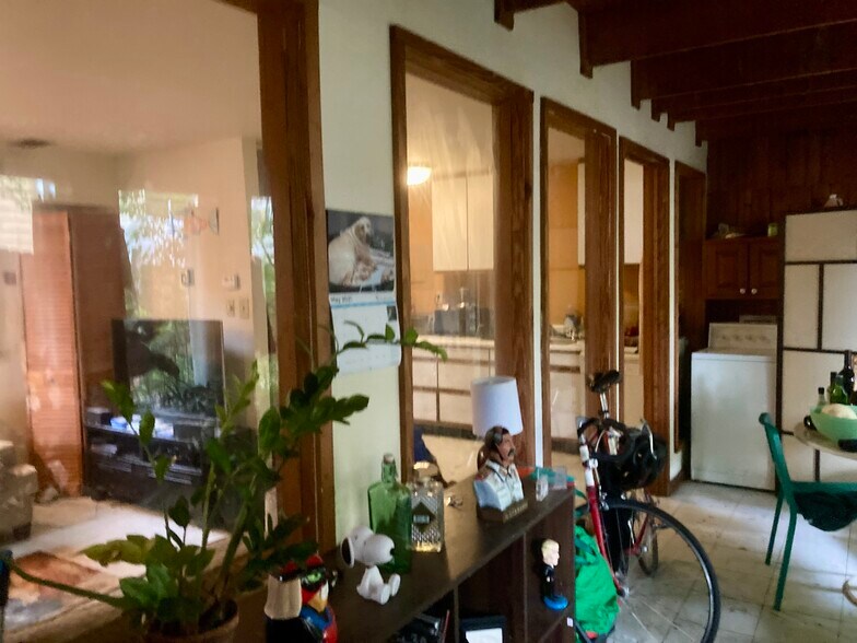 view of living room and kitchen from sunroom - 341 Glendale Ave NE
