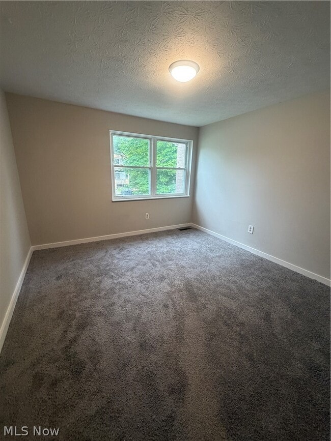 Building Photo - 9409 Manor Ave