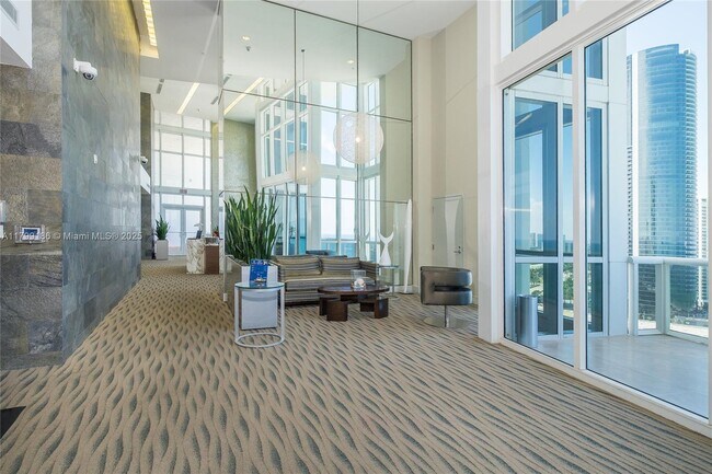 Building Photo - 18201 Collins Ave