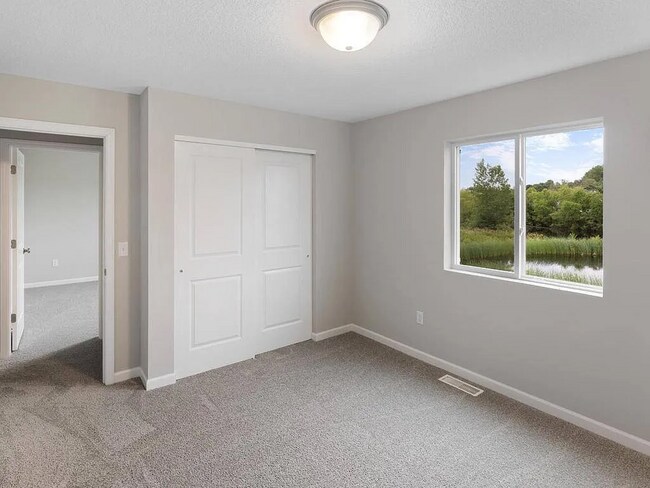 Building Photo - Gorgeous 2025 4BR/3BA St Michael Home Available 4/10/26!