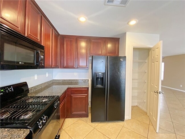 Building Photo - 6496 Robusta Ct