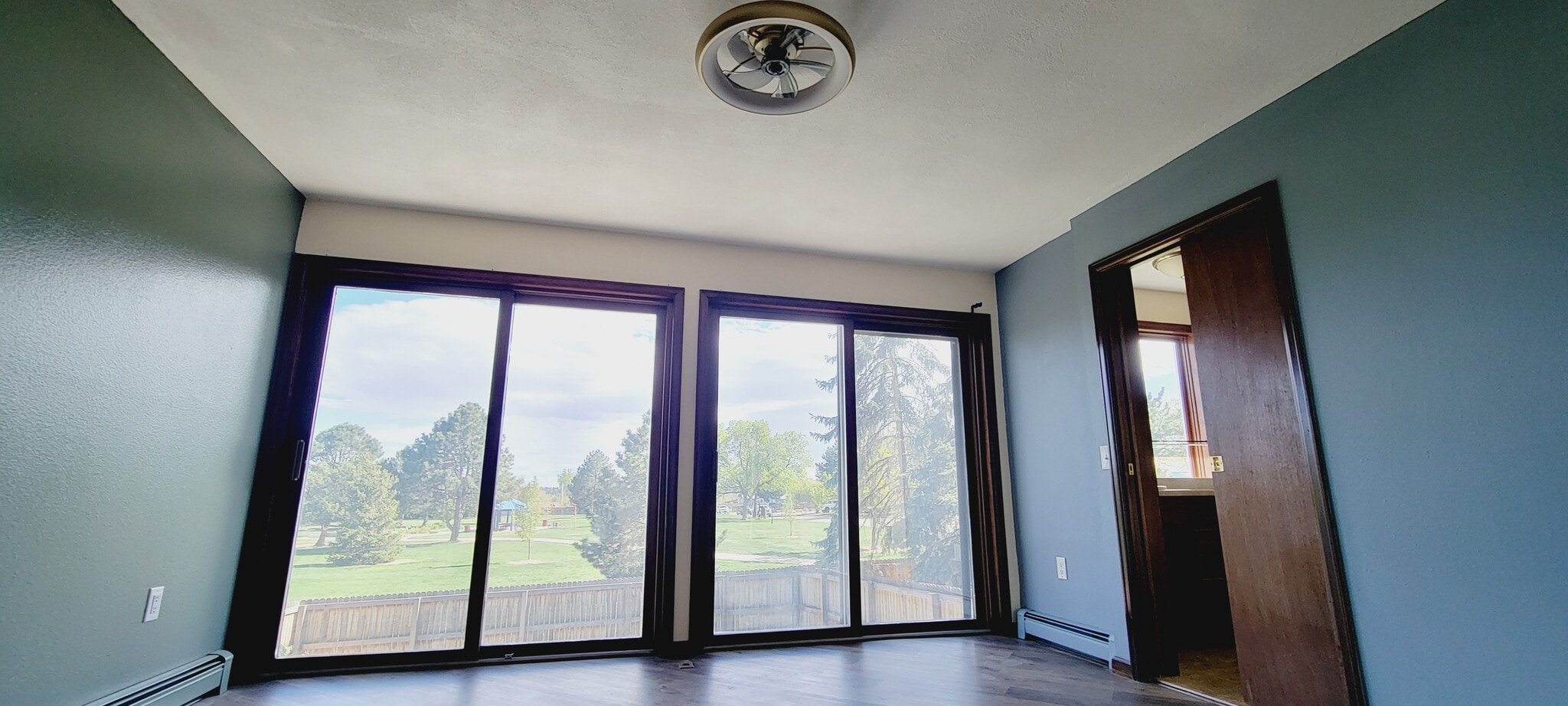 Main Bedroom with Multicolor Ceiling Light and Air Fan - 6290 Wolff St