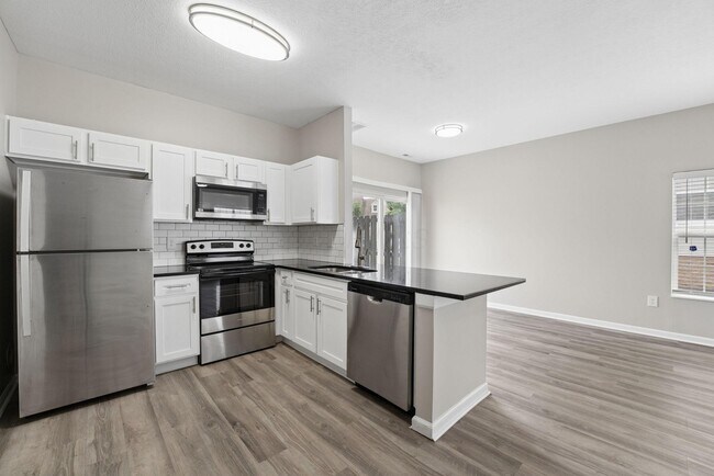 Building Photo - 2018 River Rock Way