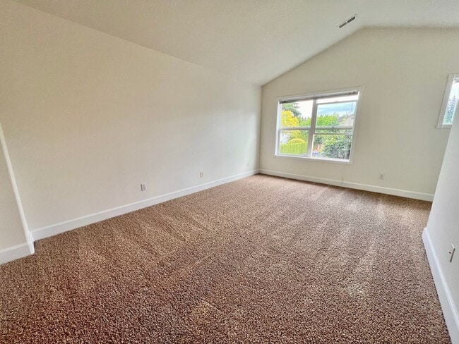Building Photo - NEWLY RENOVATED! Spacious 2-Bedroom Townhome in a Charming Cul-de-Sac!