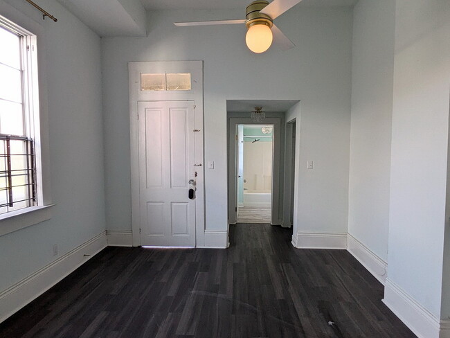 Master bedroom with ensuite bathroom. Door leads to a small porch looking into the backyard - 426 Elmira Ave