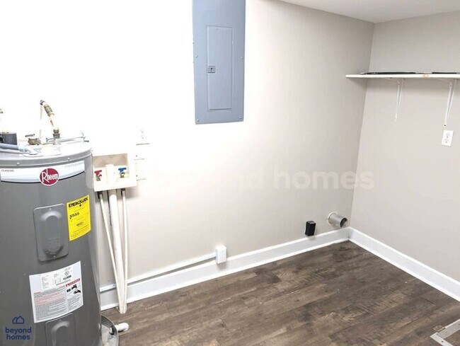 Building Photo - Updated Bungalow with Massive Deck and Fully Fenced Yard!