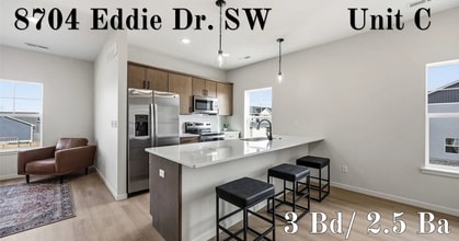 Building Photo - Big Ben at the Loop – Brand New 3 Bedroom Condo | Attached 2-Stall Garage