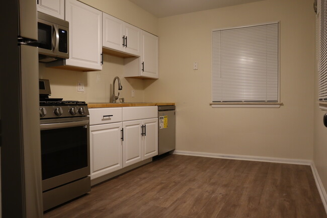 Kitchen view from side door entry way - 3421 Croissant St