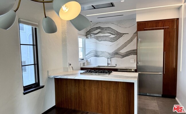 Building Photo - 1302 N Sweetzer Ave