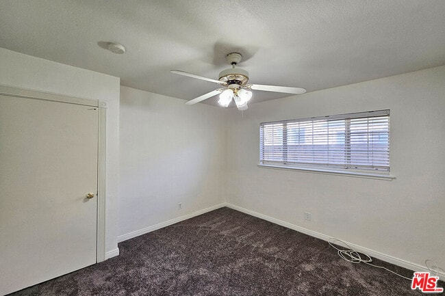 Building Photo - 9321 Donna Ave