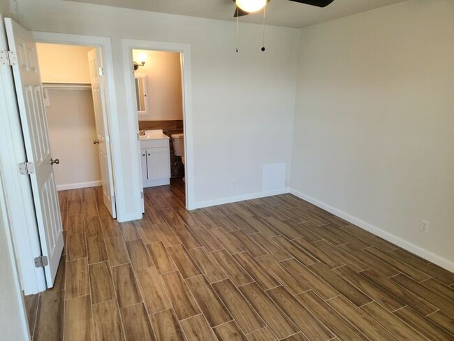 Building Photo - Two bedroom fully remodeled with refrigera...