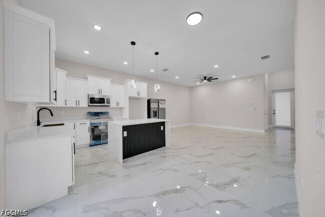 Building Photo - 4648-4650-4650 Leonard Blvd S