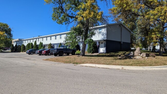 Building Photo - Conveniently located Riverbend Apartments feature a quiet community with a large green space