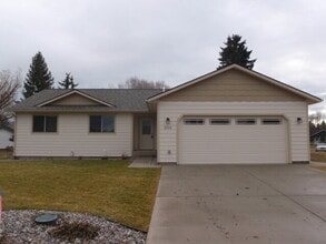 Building Photo - Newer house with attached garage. Half mon...