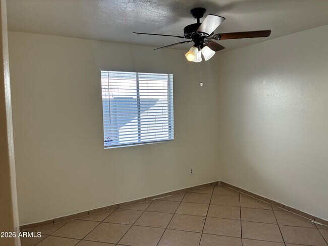 Building Photo - 8819 W Roma Ave