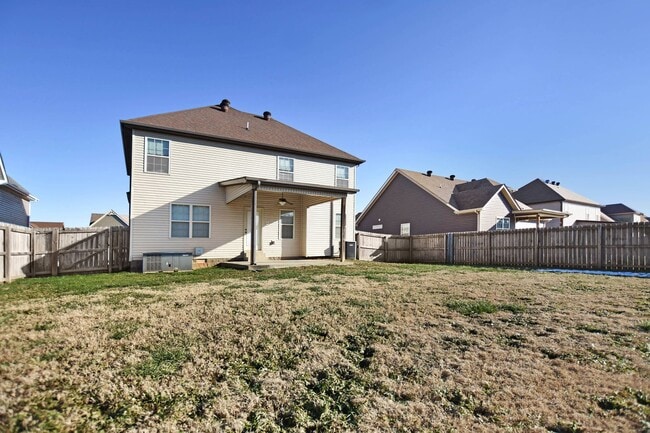 Building Photo - Pet Friendly Three Bedroom with Bonus!