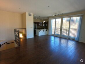 Building Photo - Spacious sun-drenched 2br/2.5ba condo with...