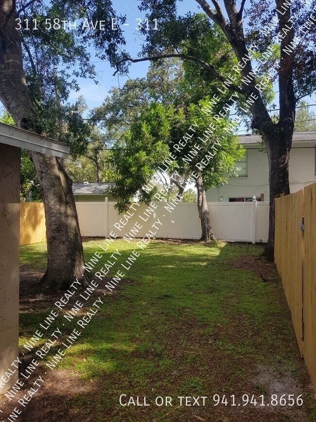 Building Photo - 311 58th Ave E