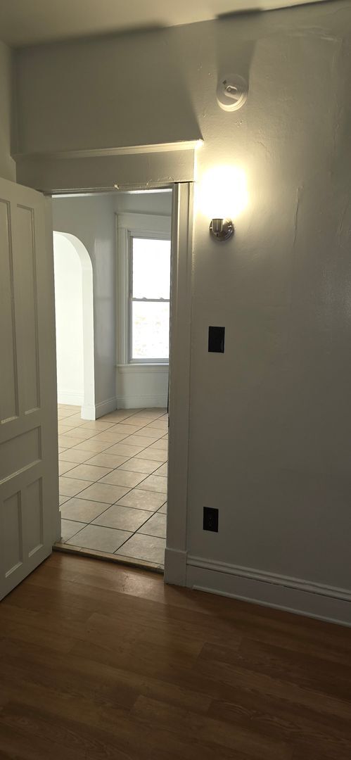 Building Photo - Large remodeled 4 bedroom with off street parking available