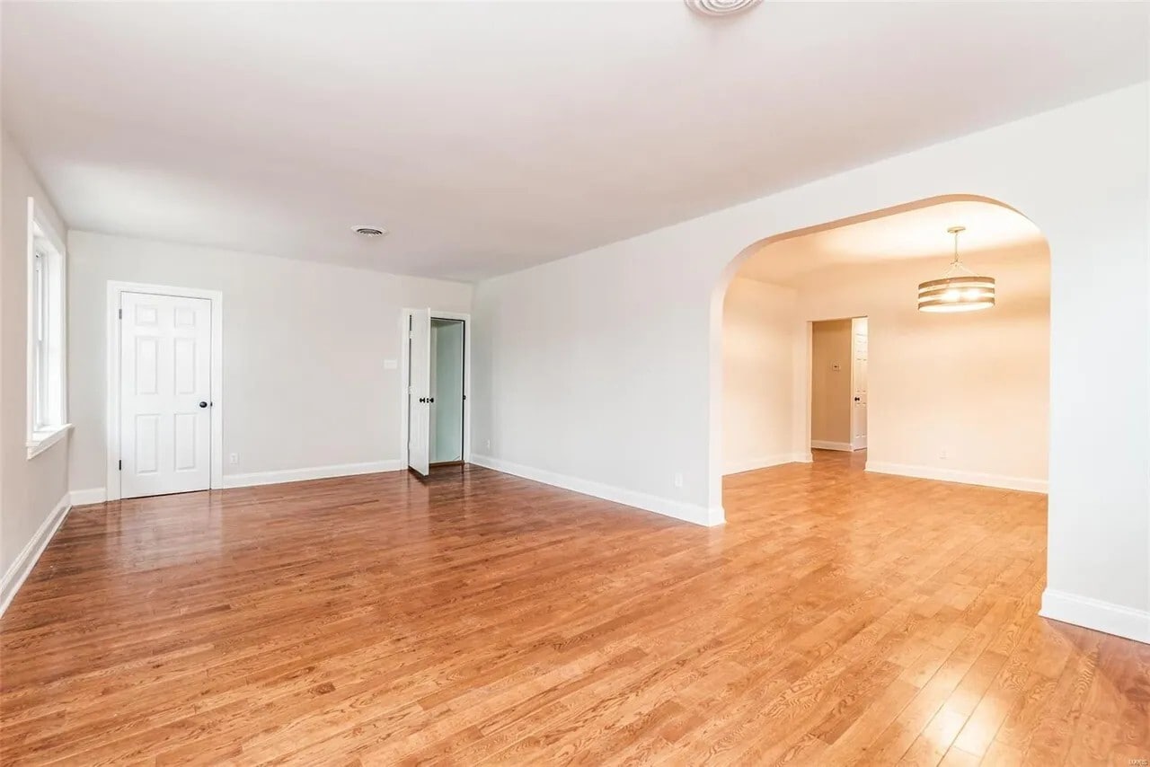 living room w/ coat closet - 7136 Amherst Ave