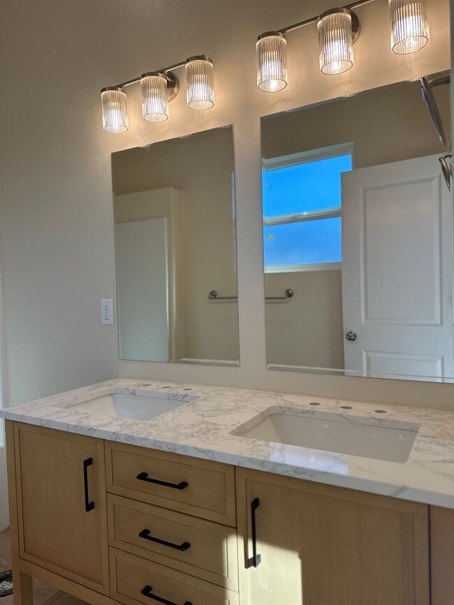 Building Photo - Bright & New 2 Bed / 2 Bath with Vaulted Ceilings & Covered Parking!