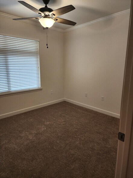 Second bedroom w/ ceiling fan - 1021 Costa Pacifica Way