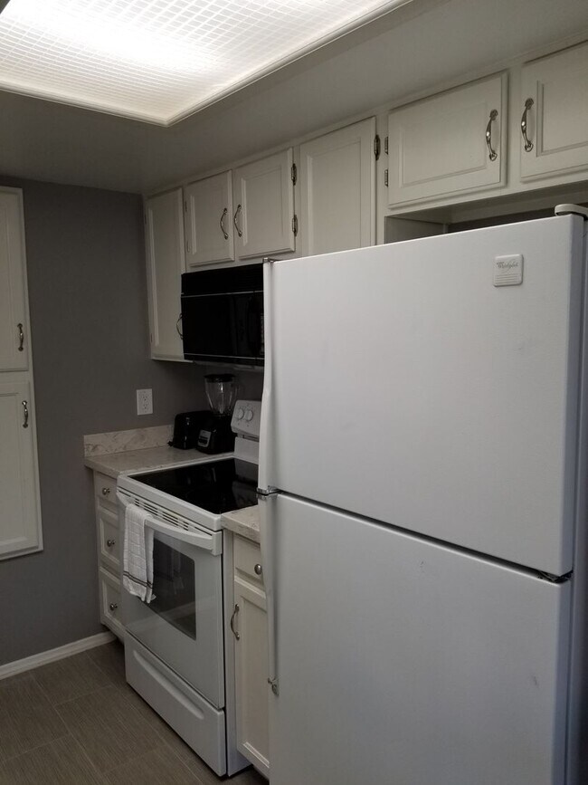 Building Photo - Cozy 1-Bedroom, 1-Bath Condo – 2nd Floor a...