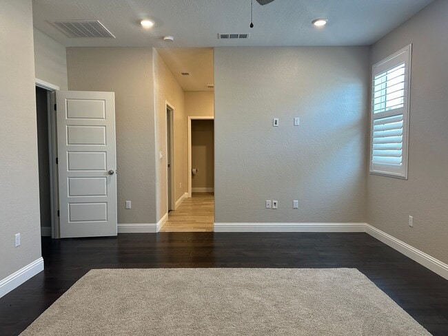 Building Photo - Modern home in a modern community featuring upgraded amities, solar, community pool + Close to Co...