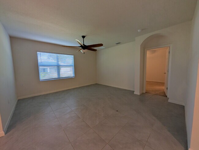 Building Photo - Modern 4-Bedroom Home with Large Backyard in Quiet SW Palm Bay – Available Mid-June