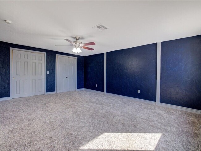 Building Photo - Spacious 4-Bedroom, 2-Bath Home with Extended Driveway & Large Backyard