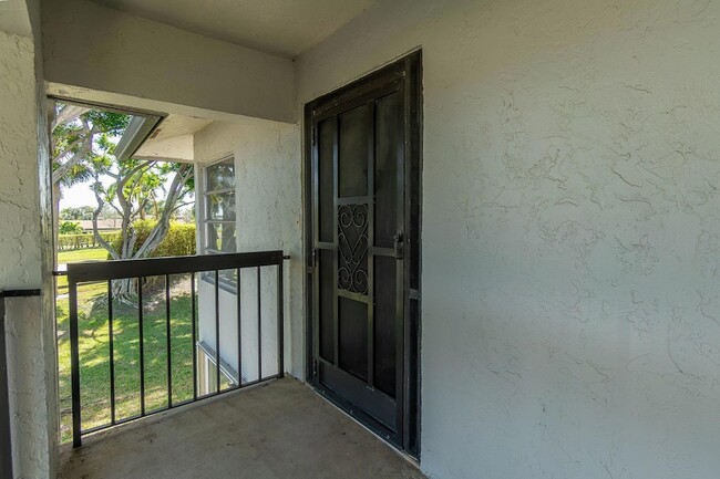 Building Photo - 13423 Fishtail Palm Ct