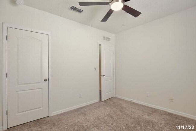 Building Photo - Spacious 3/2.5 Townhome with a 2 Car Garage and a Beautiful Pond View in Westwood Condos - Orlando!