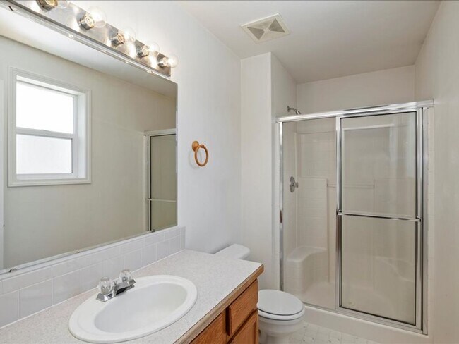 Building Photo - June Rent Free!!  Move Today!  Four Bedroom, Three Bath Home with Beautiful Backyard, Two Car Gar...