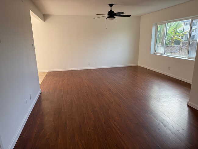 Large living room with natural light - 11954 Eucalyptus Ave