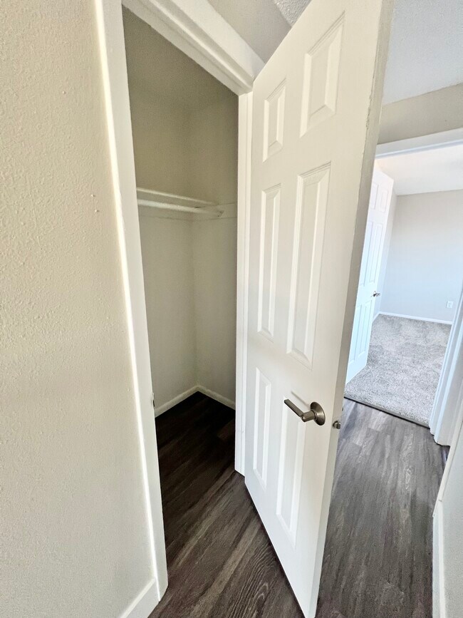 Experience the elegance of this apartment's storage solutions with sleek design. - Wadsworth Station West