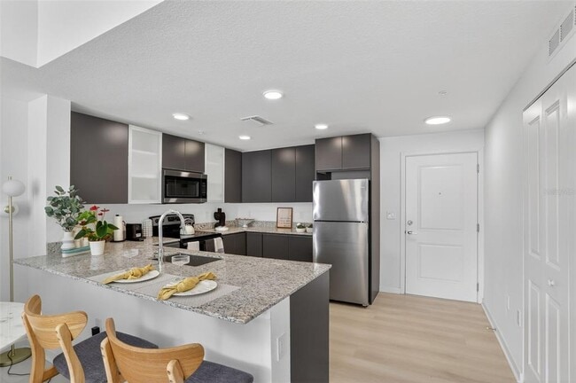 Building Photo - 5579 Millennia Park Dr