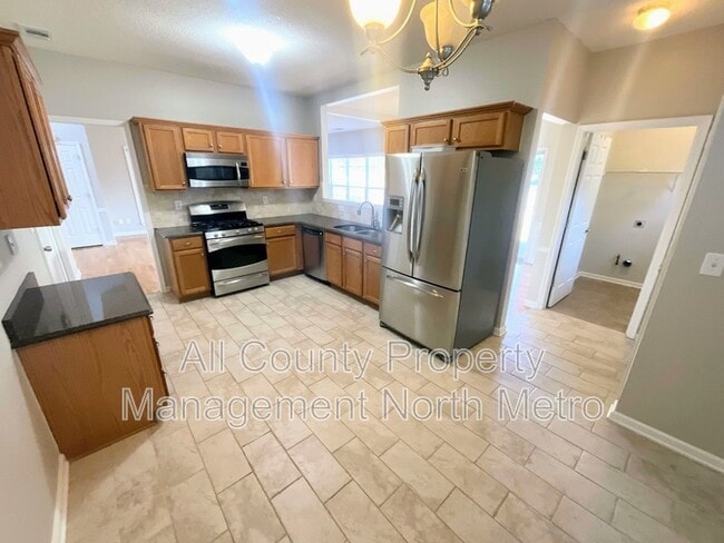 Building Photo - 5990 Barrington Ln