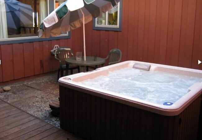 Building Photo - Unique open design,wood beams in all rooms-Very cheery and cozy. Newly remodeled, and newly furni...