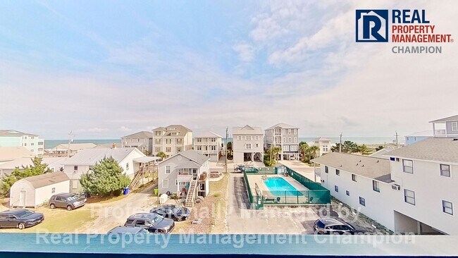 Building Photo - Year Round Fully Furnished Ocean View Condo on Carolina Beach