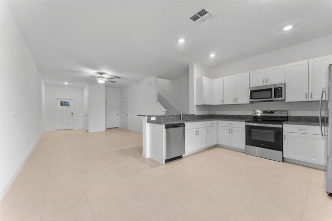 Building Photo - Luxury 3 BR + LOFT/2.5BA/1 Car Garage Luxury Townhome in the highly desirable GATED community of ...