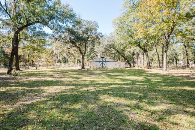 Building Photo - Secluded Four Bedroom Home on Seven Acres in Midway Farms!