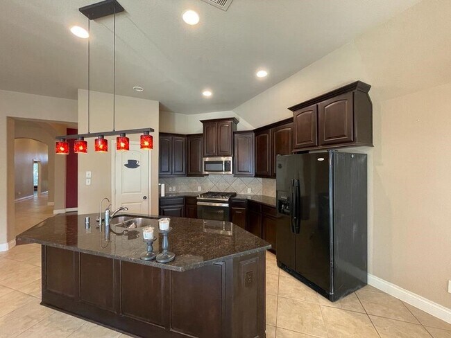 Building Photo - 6706 Aqua Falls