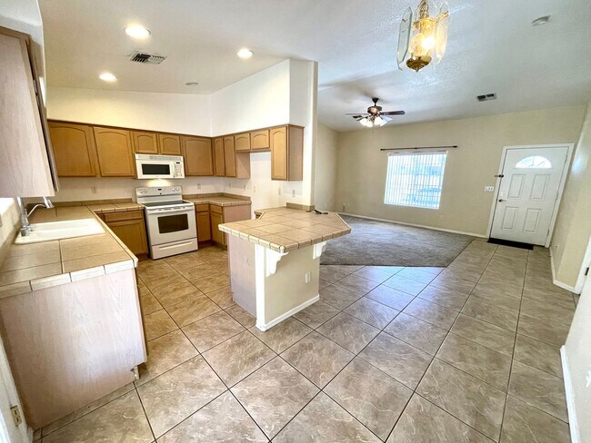 Building Photo - Inviting 3 Bedroom Home with RV Parking an...
