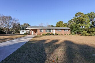 Building Photo - Christmas Move-In Special!! $500 off first month's rent