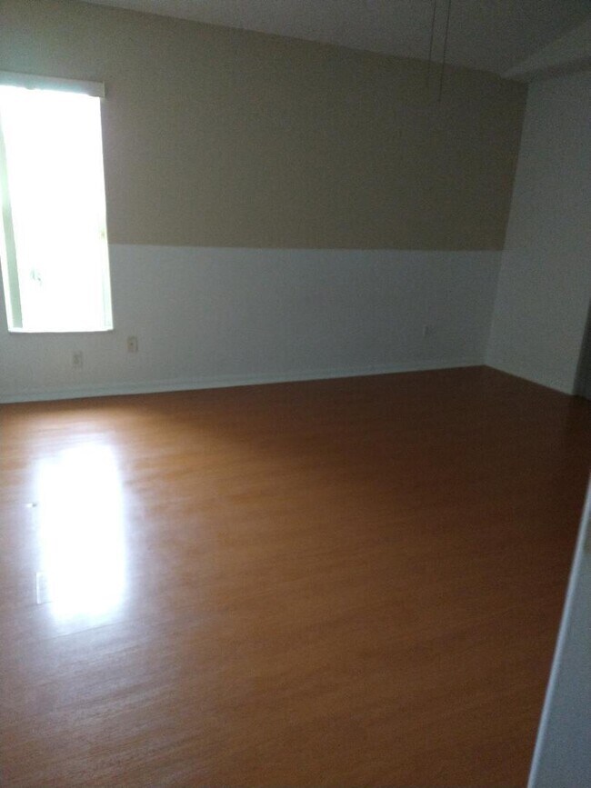 Building Photo - 6444 NW Hacienda Ct