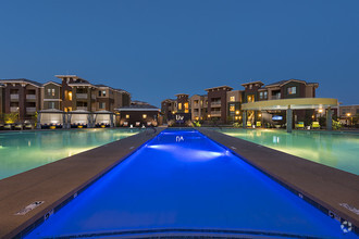 Relax and unwind at one of our resort-inspired heated pools. - Liv Ahwatukee