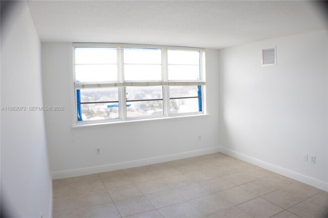 Building Photo - 6917 Collins Ave