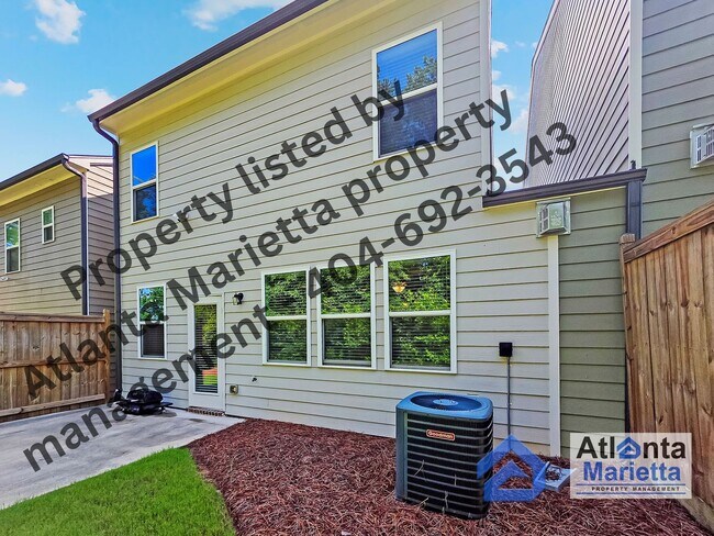 Building Photo - Spacious & Stylish 4BR/3.5BA Townhome Near...