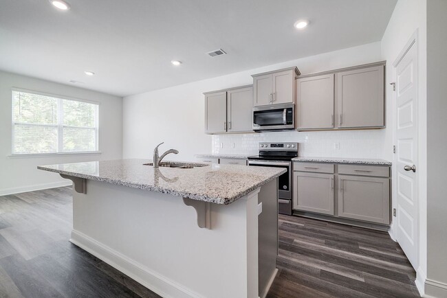 Building Photo - Beautiful 4BR Home in Woodland Trail – Top...